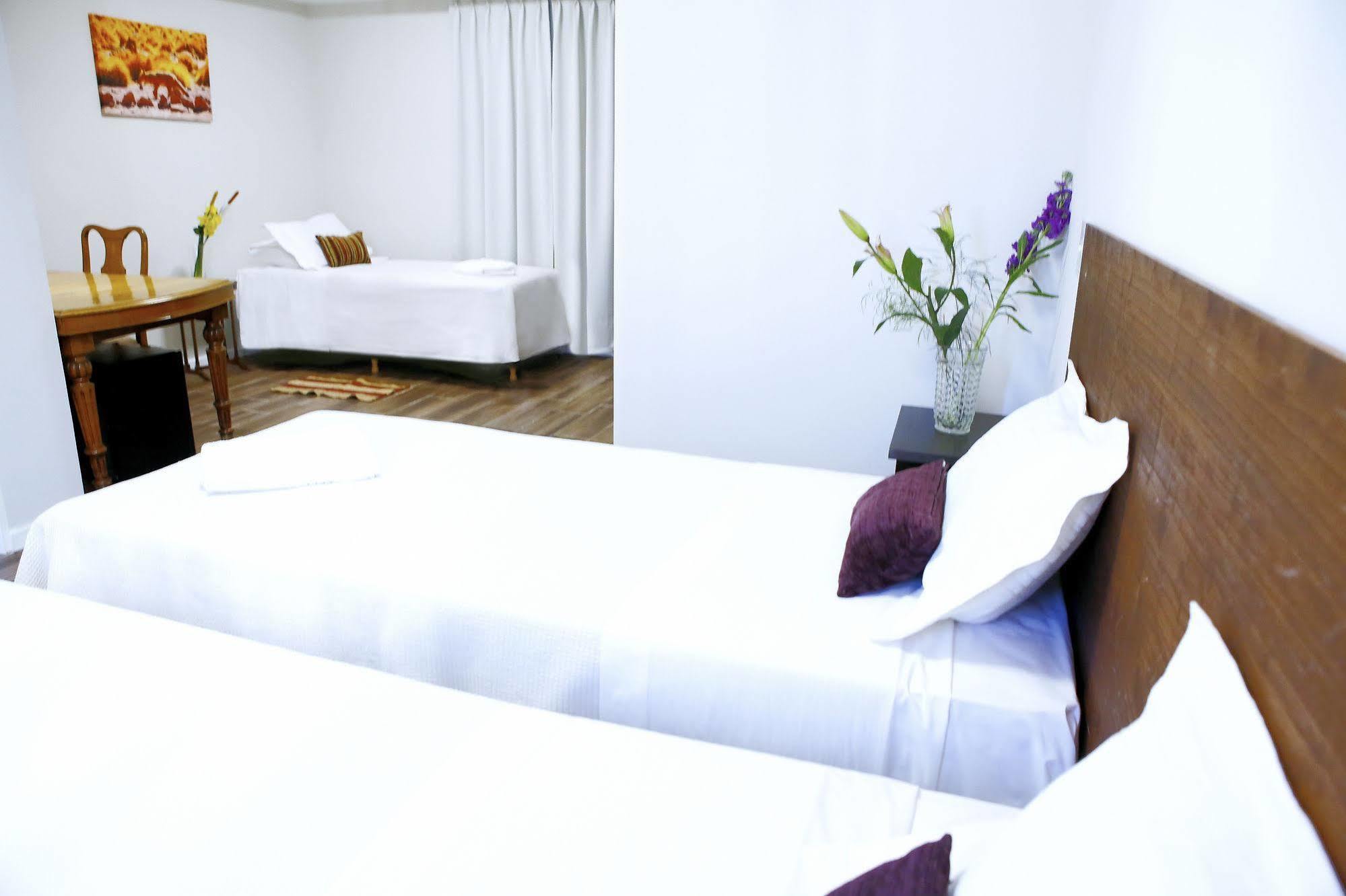 Quarto Triplo Premium